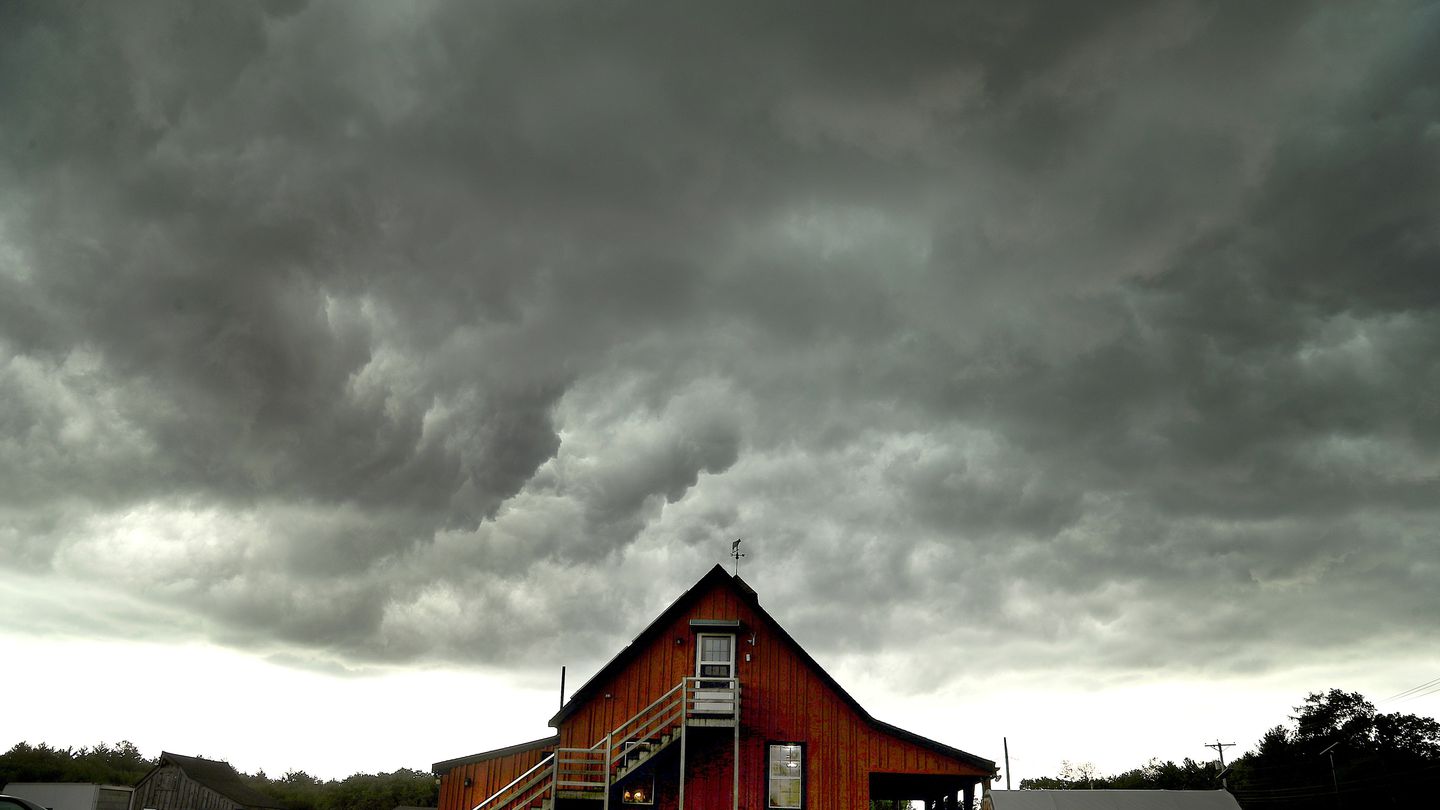 Ominous storm clouds hung over the farmstead barn at Hanson Farm.