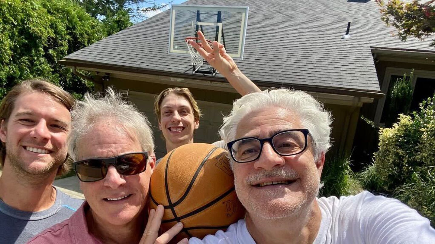 Mark Patinkin, second from left holding the basketball, with filmmaker Dante Bellini Jr., right, Patinkin's son Alexander, left, and Deven Bussey, who also worked on the project, rear.