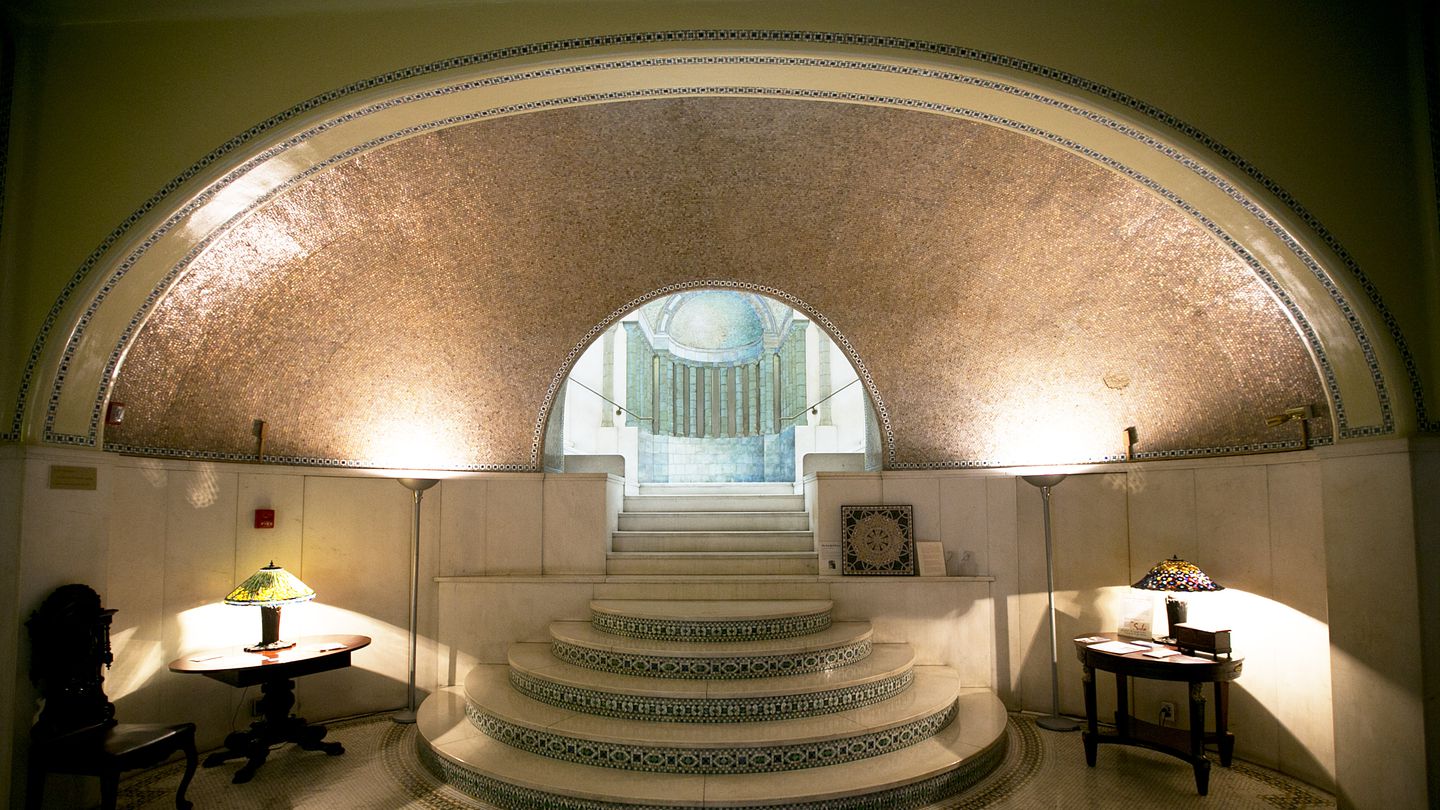 A view of the staircase in the entry hall of Boston's Ayer Mansion, the only standing home left that was completely designed by Louis Comfort Tiffany.
