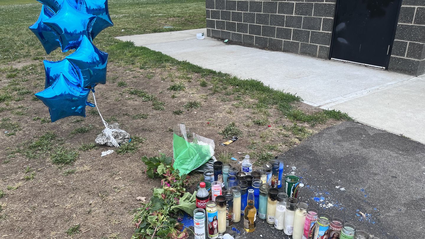 The makeshift memorial in Donigan Memorial Park in Providence, where 19-year-old Juan Carlos Morales was killed Saturday night.