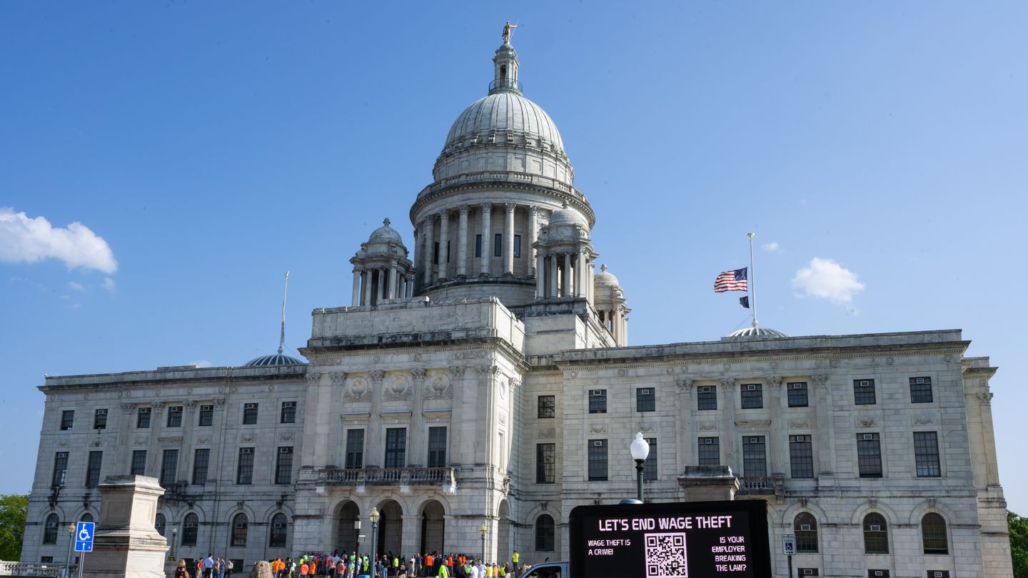 A truck advocating for the end of wage theft is parked in front of the Rhode Island State House during a rally of workers in support of proposed legislation that would increase penalties for wage theft and employee misclassification in Providence, R.I. on Thursday, May 11, 2023.