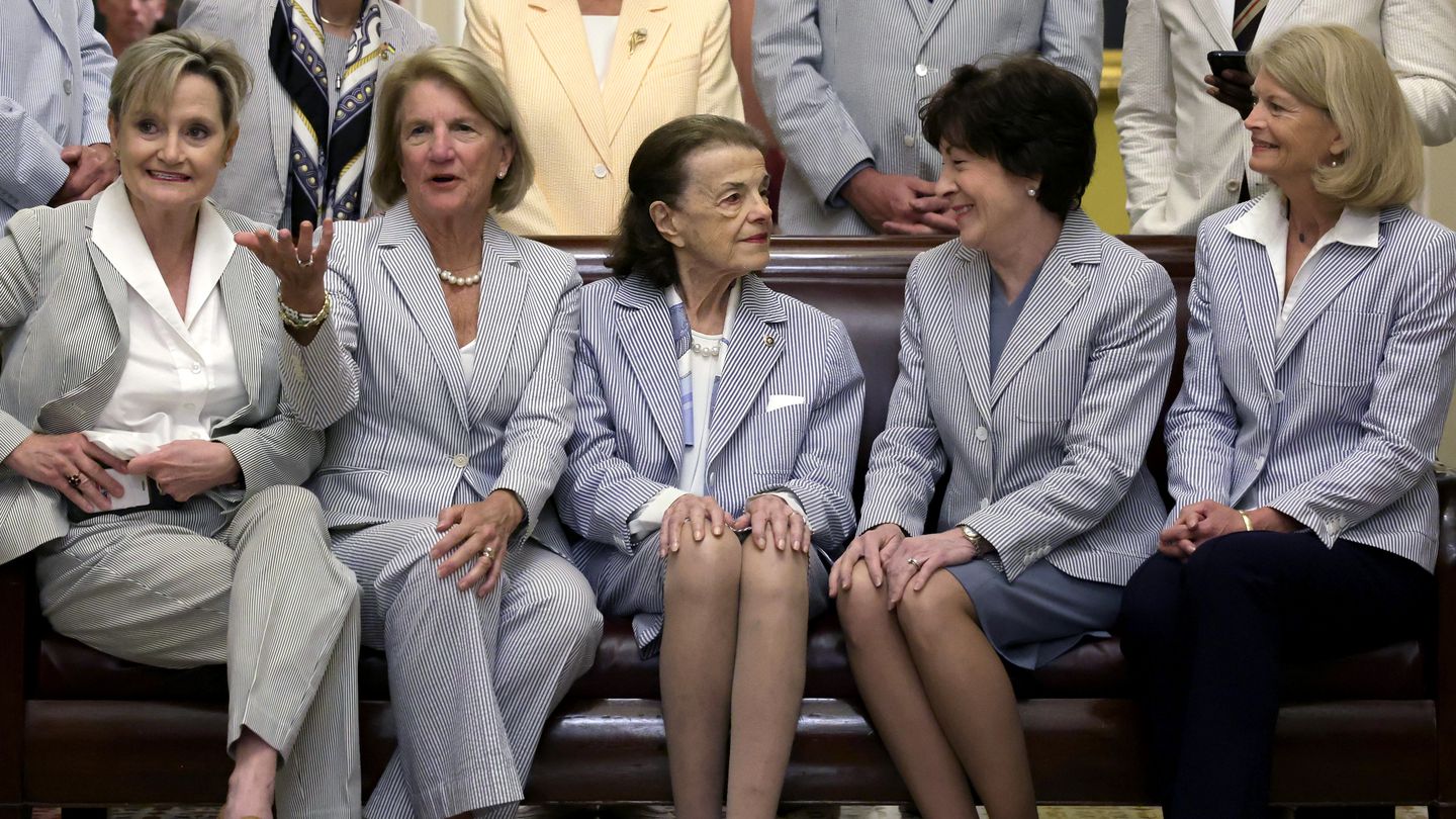 Senator Dianne Feinstein (middle) sat with Senators Cindy Hyde-Smith, Shelley Moore Capito, Susan Collins, and Lisa Murkowski in a photo session with congressional staff on Seersucker Day on June 8 in Washington, D.C.