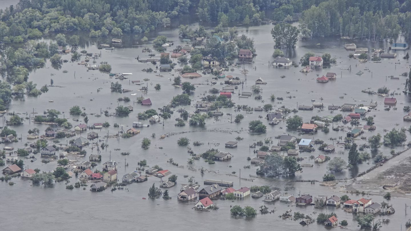 Houses flooded by the destruction of the Kakhovka dam on the Russian-controlled bank of the Dnieper River across from Kherson, Ukraine, on June 10.
