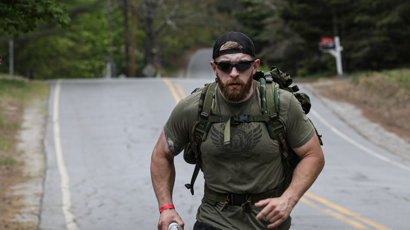 Veteran Noah Fogg, carrying a 30-pound rucksack, was the first to complete the 22-kilometer loop during the Hidden Battles Foundation's 22 for the 22 event.