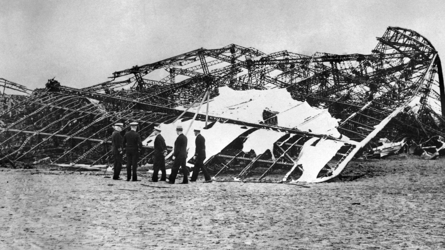 The remains of the German zeppelin Hindenburg after it exploded at Lakehurst, N.J., in 1937. If the US economy were a zeppelin, it would be losing altitude, but the landing doesn’t necessarily have to be hard and costly.