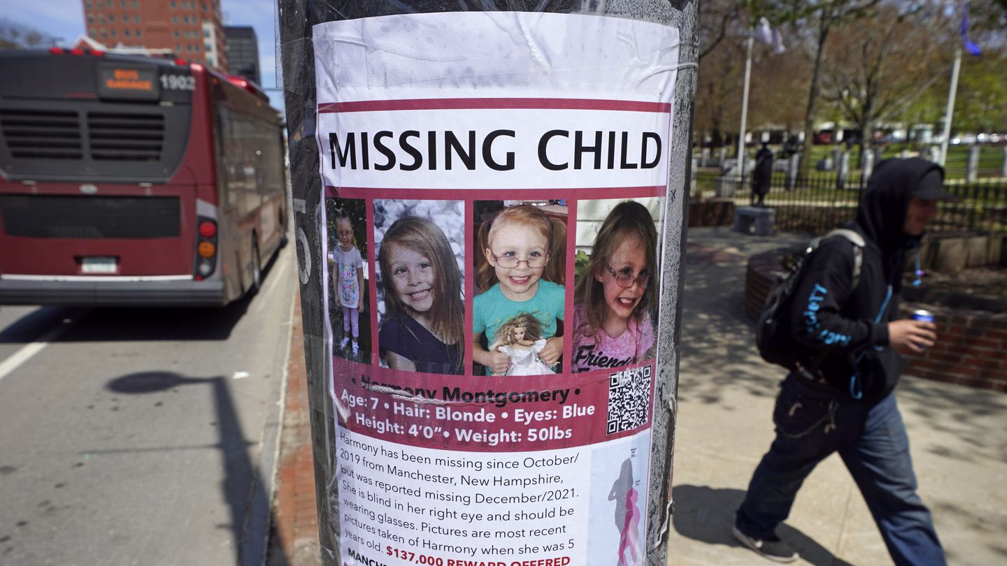 A man walks past the "missing child" poster for Harmony Montgomery on Thursday, May 5, 2022, in Manchester, N.H.